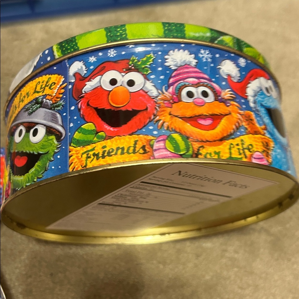 Tin collectors Elmo Holiday Tin Red & Green Festive Cookie Tin. Wonder woman. - Picture 3 of 5